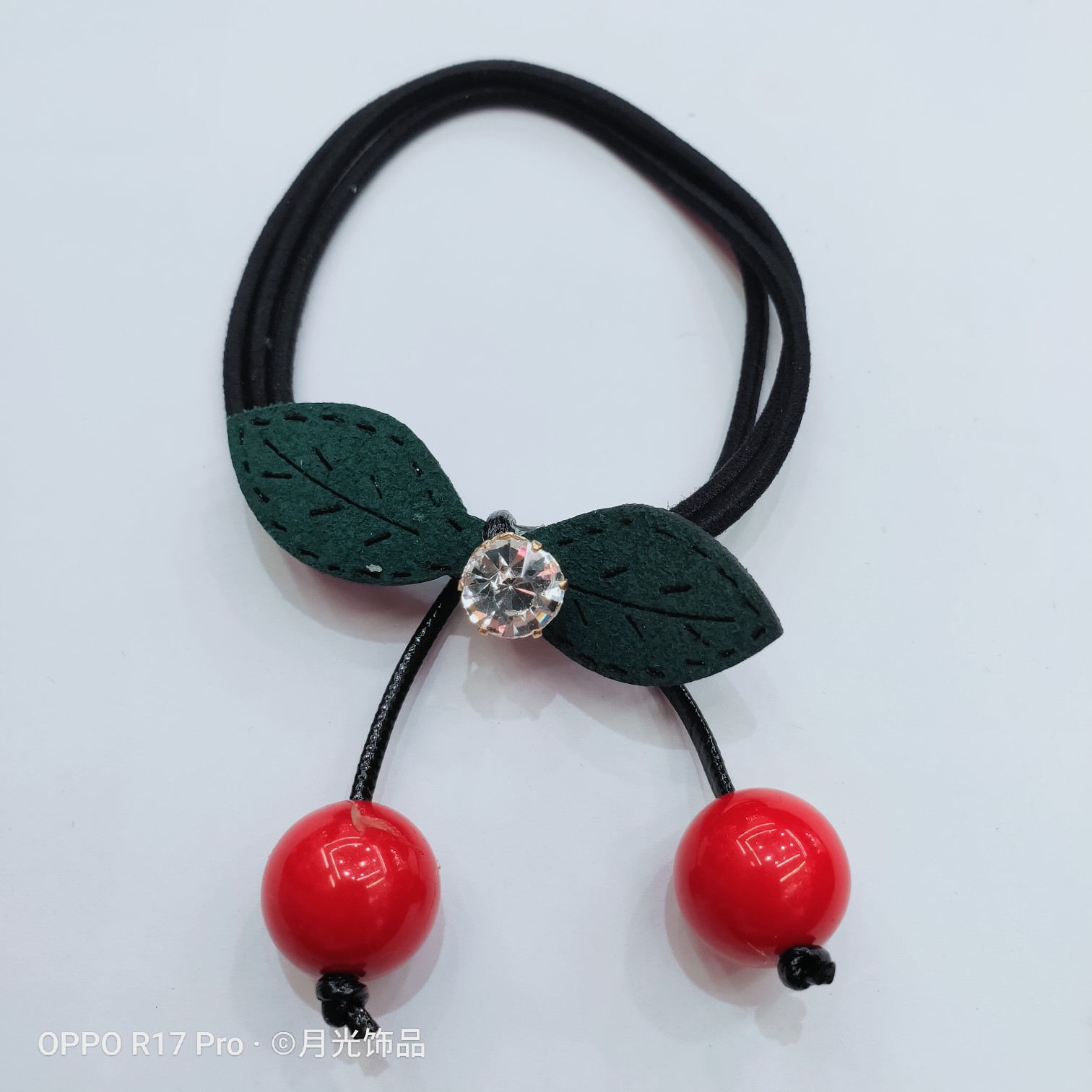 Wholesale of Korean-style trendy red pearl green leaf diamond-encruffed small cherry hair bands, hair ties and leather cases details Picture