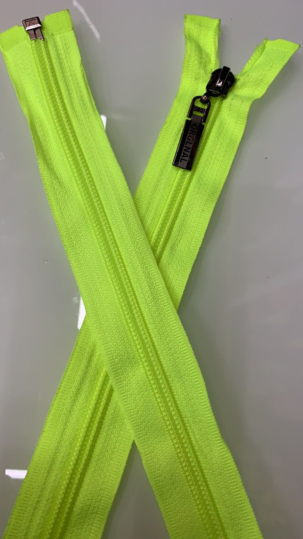 The manufacturer sells 5# nylon open OR laser head zippers