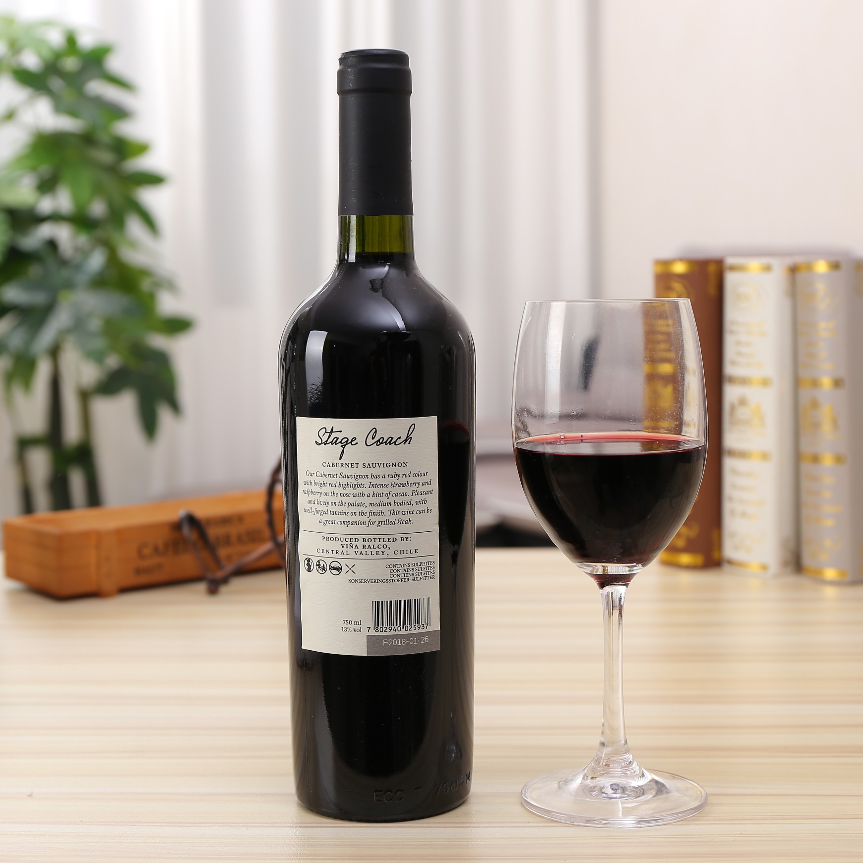Close-up of wine poured into a glass showing rich color