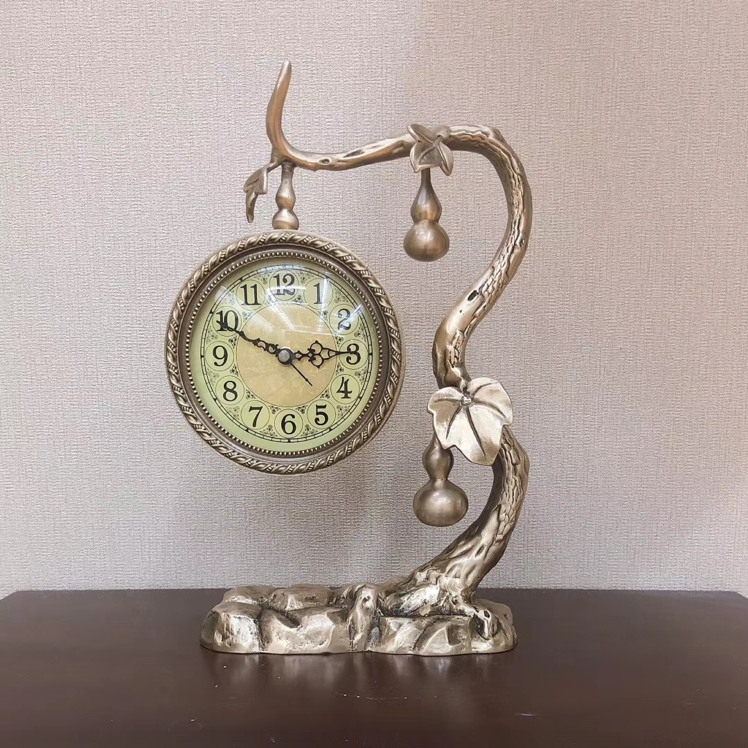 A wooden copper wall clock with auspicious and lucky Chinese gourd kids