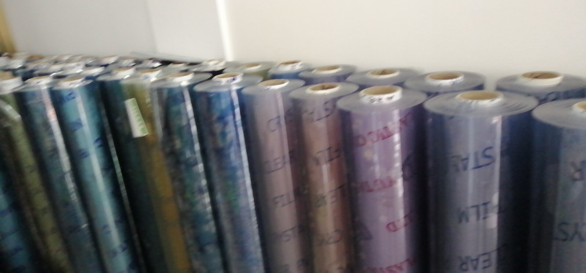 In stock: PVC, TPU, EVA, super transparent film, colored film, embossed film, stationery film, iridesy film, etc