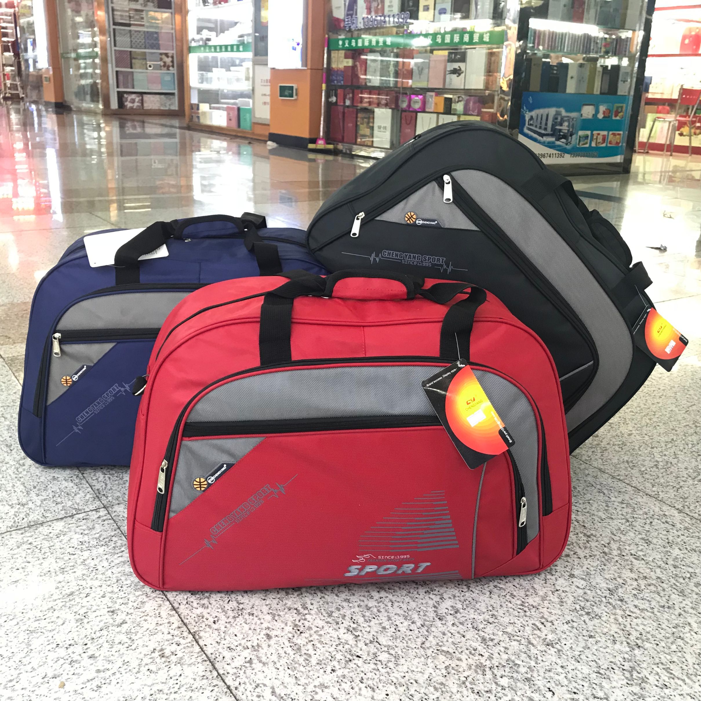 义乌好货 防水尼龙手提旅行包出差旅游大容量男女行李包短途旅行