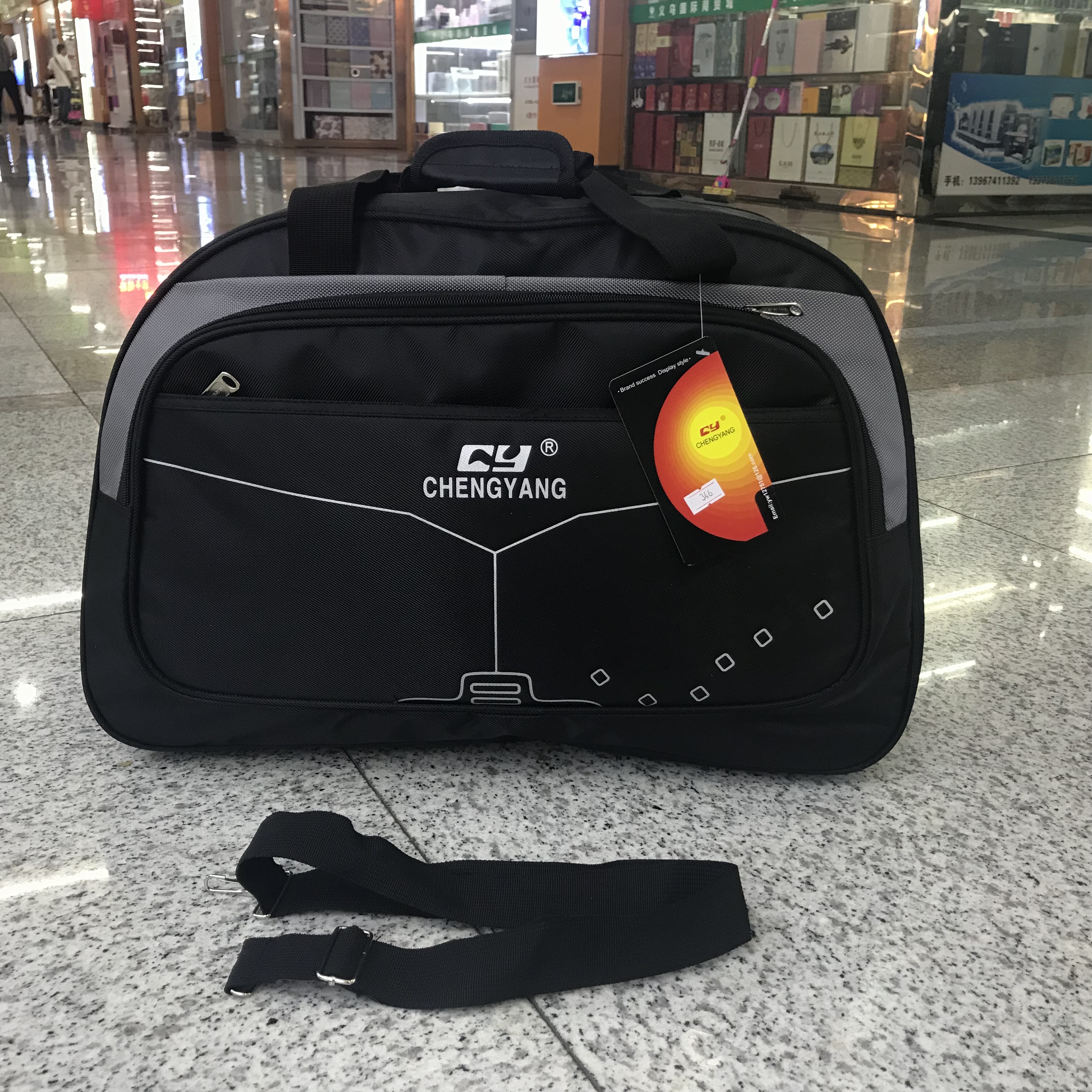 Yiwu quality waterproof nylon hand-held travel bags for business trips and Tours, large-capacity luggage bags for men and women detail image 2