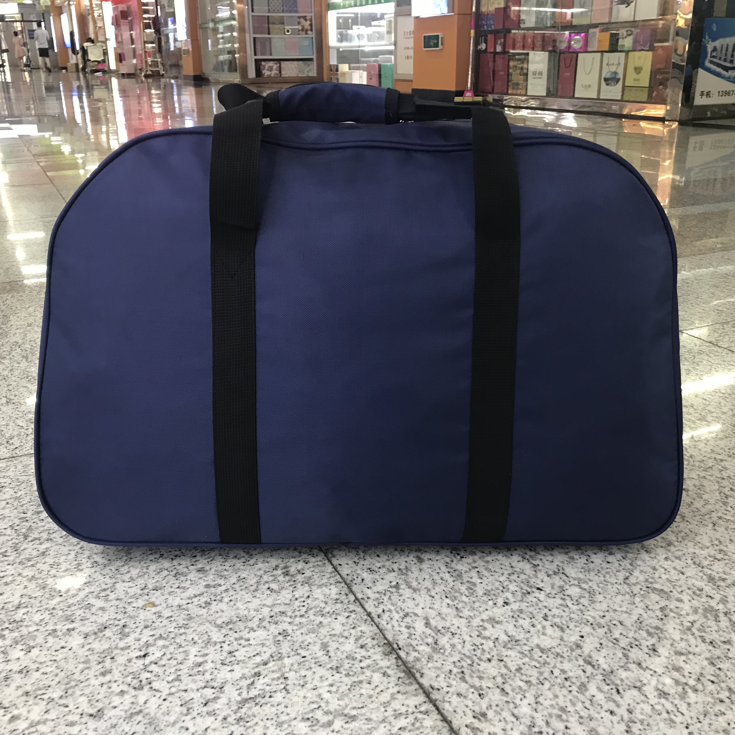 Yiwu quality waterproof nylon hand-held travel bags for business trips and Tours, large-capacity luggage bags for men and women, short trips detail image 4