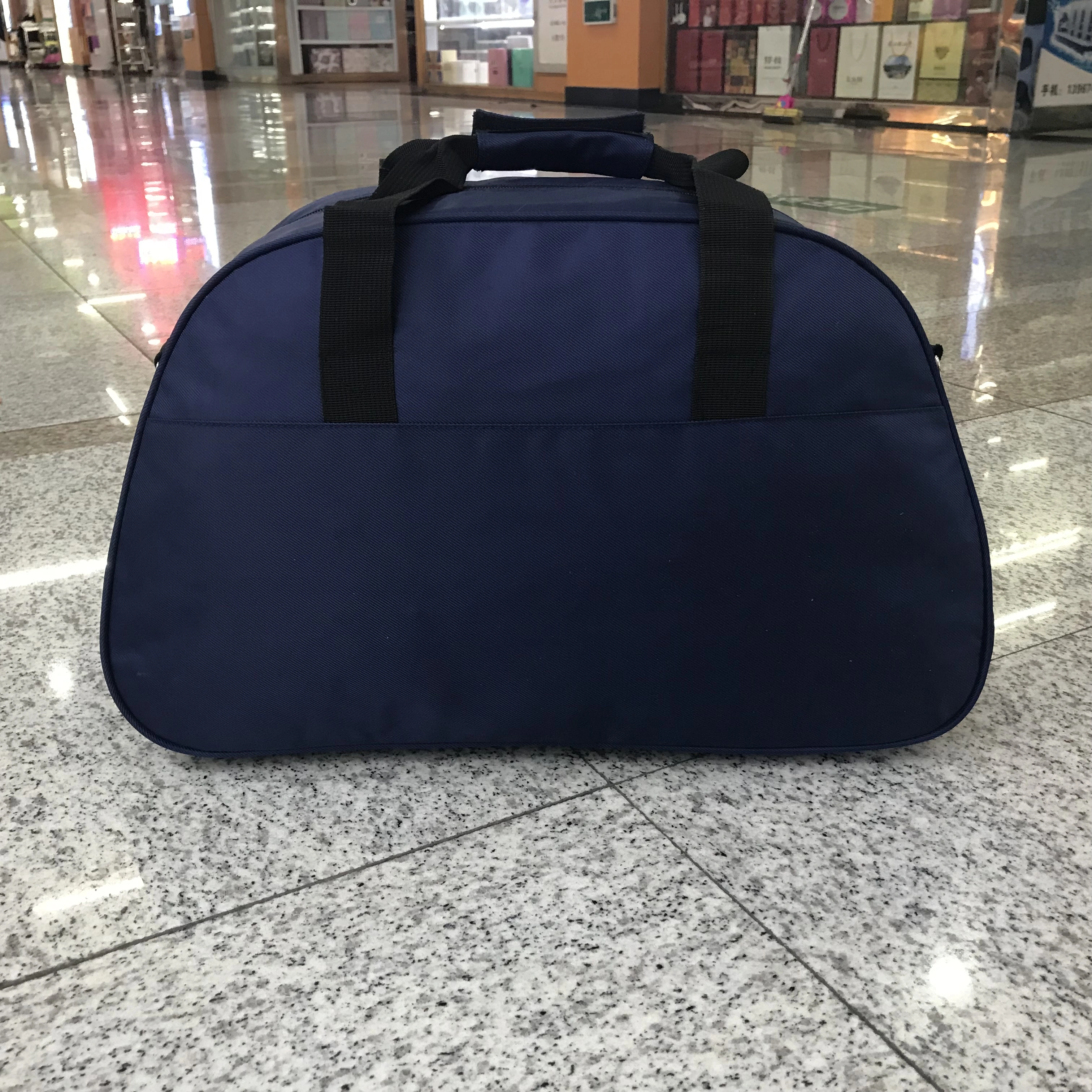 Yiwu quality hand-held travel bags, business trip luggage bags, single-shoulder waterproof travel bags, men's and women's short-distance travel bags detail image 3