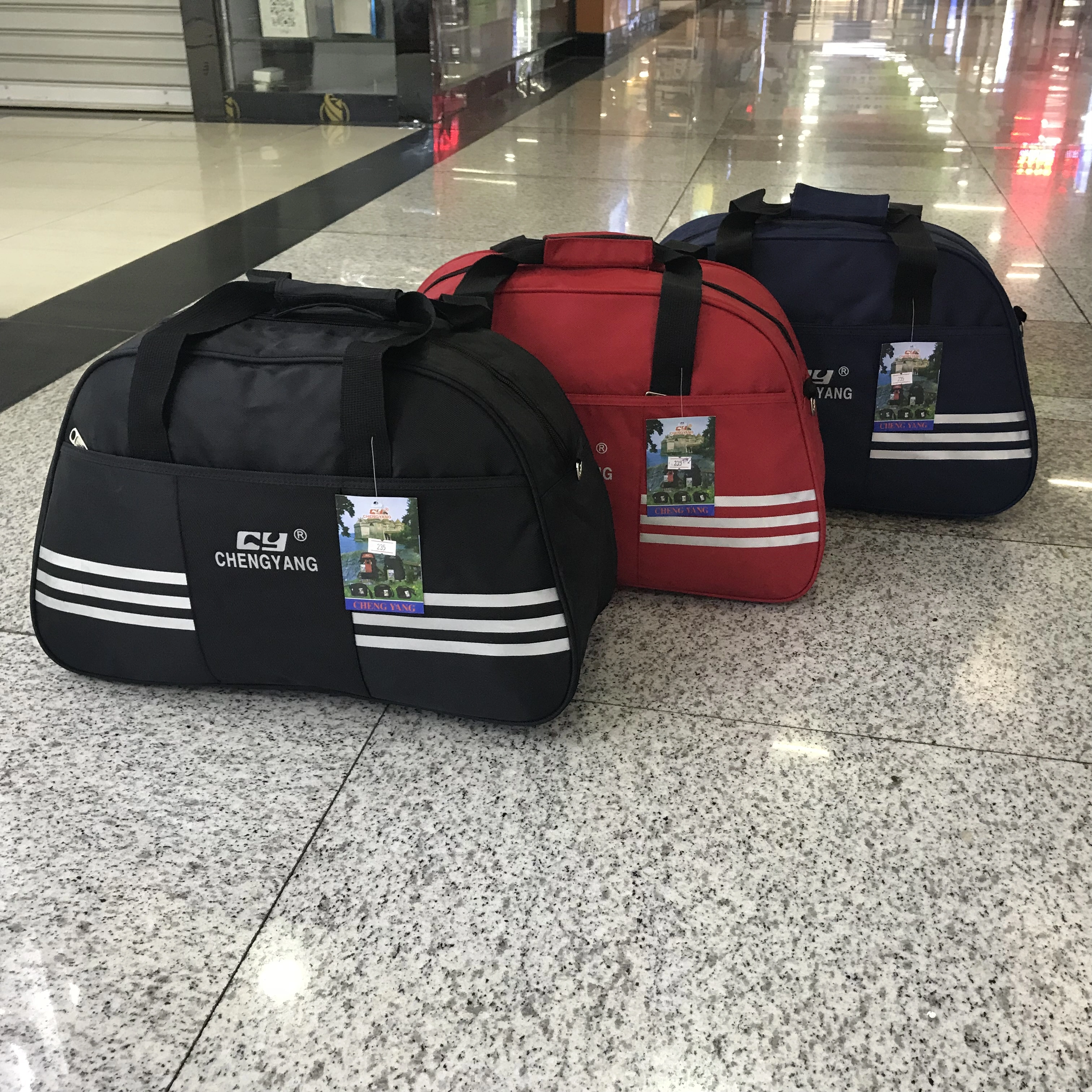Yiwu quality hand-held travel bags, business trip luggage bags, single-shoulder waterproof travel bags, men's and women's short-distance travel bags detail image 1