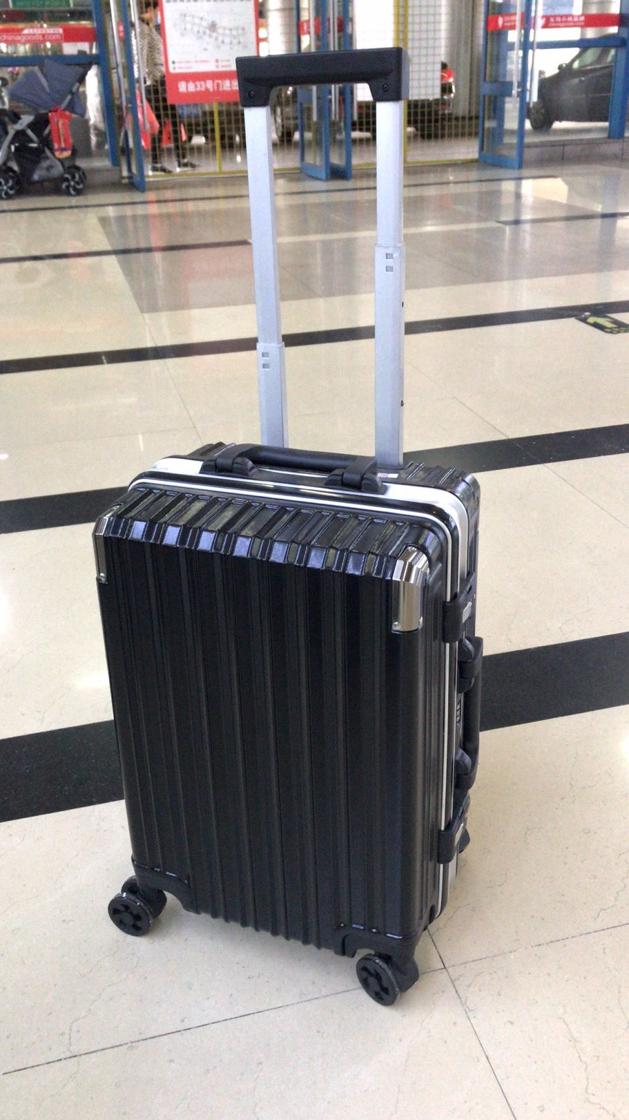 ABS+PC拉杆箱万向轮密码锁旅行箱登机箱行李箱20寸24寸两件套图