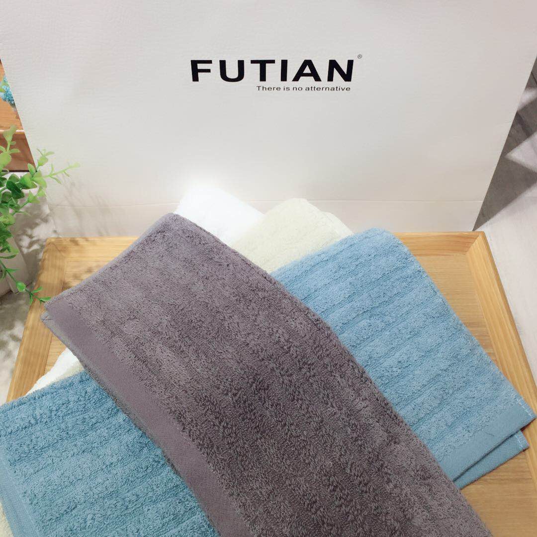 Eco-Friendly Cotton Towel on Wooden Shelf