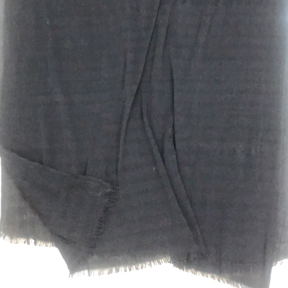 Knitted scarf display in various materials