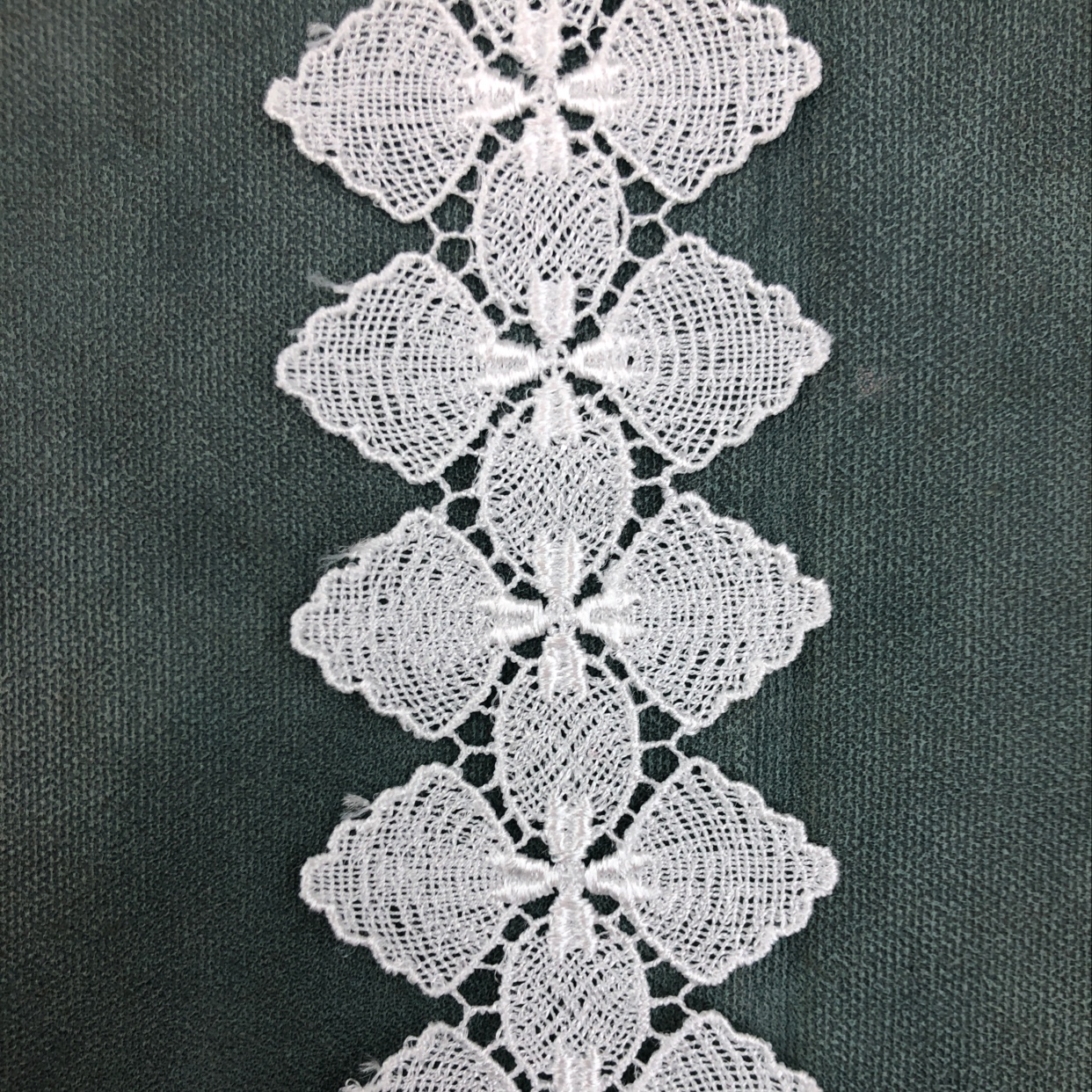 Water-soluble lace for gloves and clothing accessories