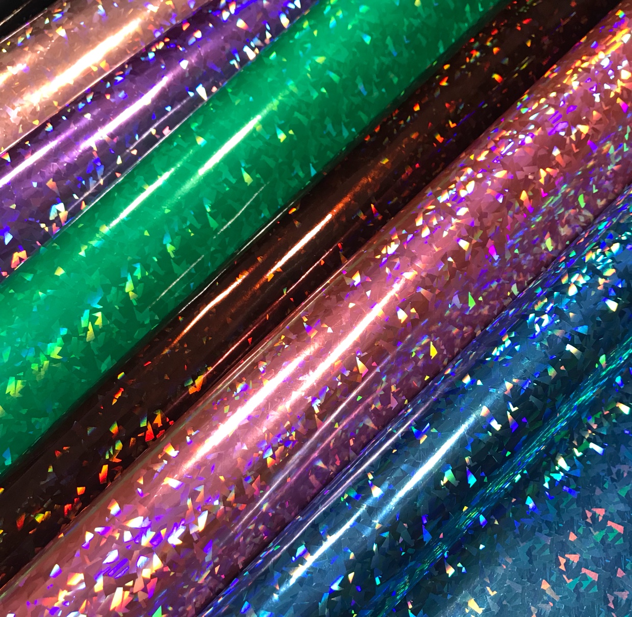Laser irion-dollar glass fragments, PU mirror fabric, seven-color fabric bags and artificial leather in stock