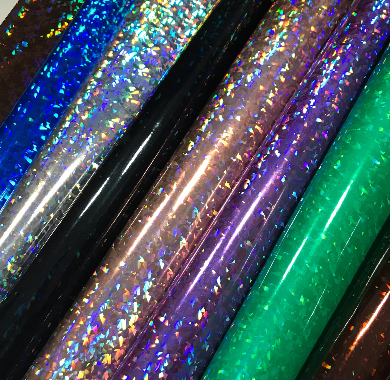 Laser irion-dollar glass fragments, PU mirror fabric, seven-color fabric bags and artificial leather in stock Item Picture