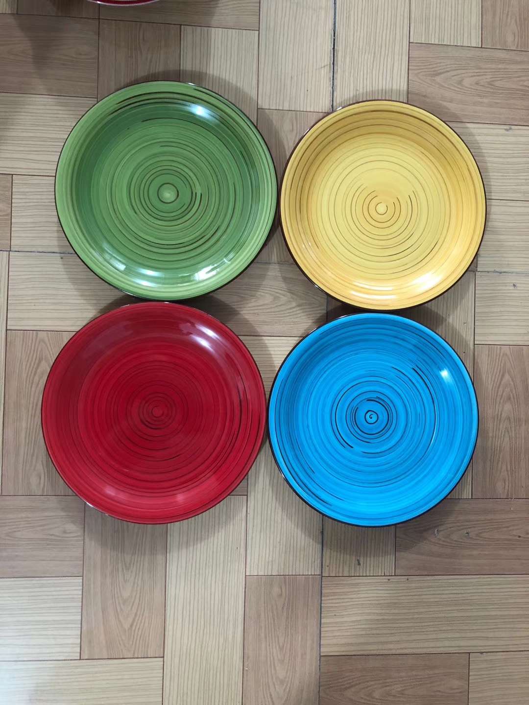 Stacked ceramic dishes with protective padding