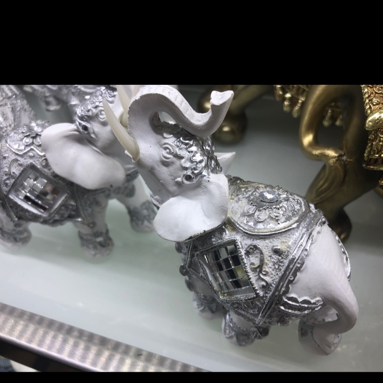White craft elephants are exquisitely carved and decorated with resin thumbnail