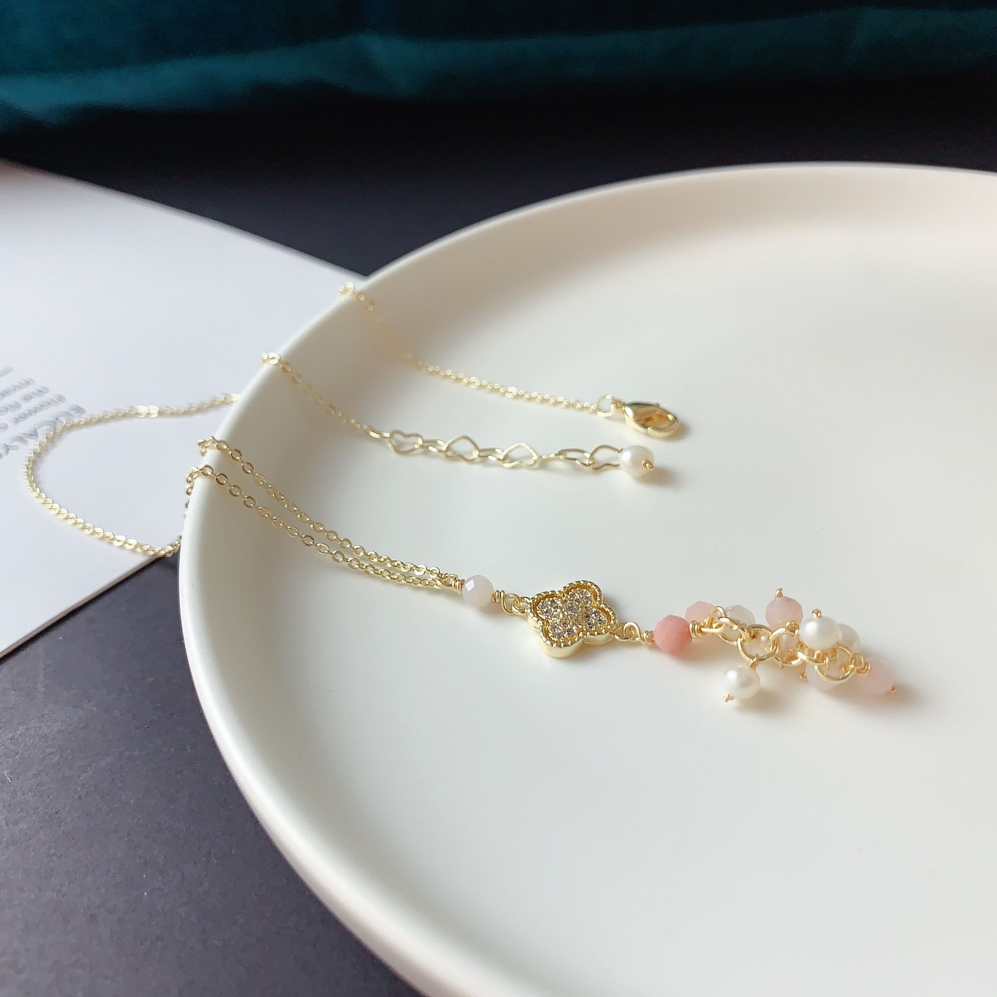 Yiwu Selection original design micro - set four-leaf clover powder Ao Bao pearl necklace