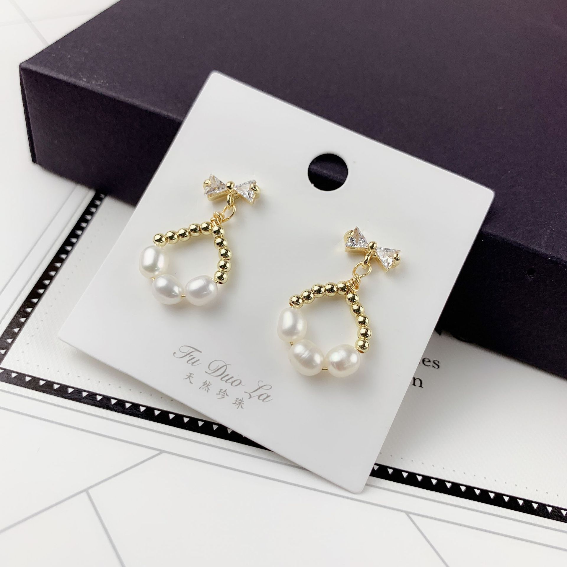 Yiwu Selected Goods natural pearl joker bow-tie earrings jewelry Korean version light luxury earrings female jewelry