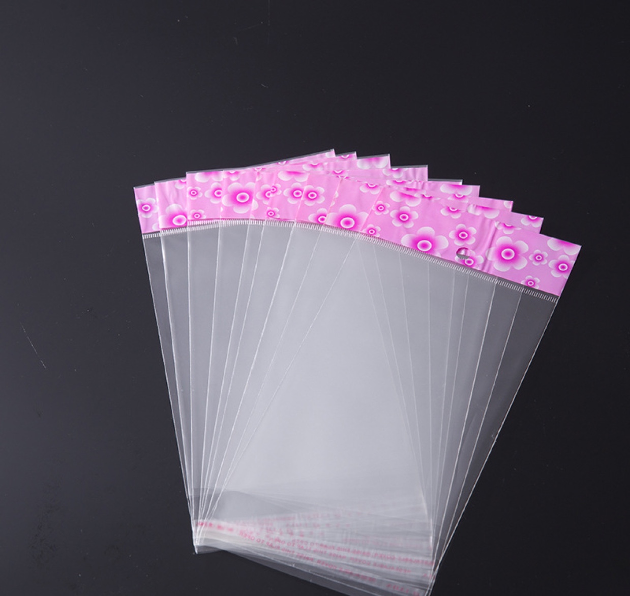 OPP pink flower card head bag, 2.3C, 10* 20,100 pieces