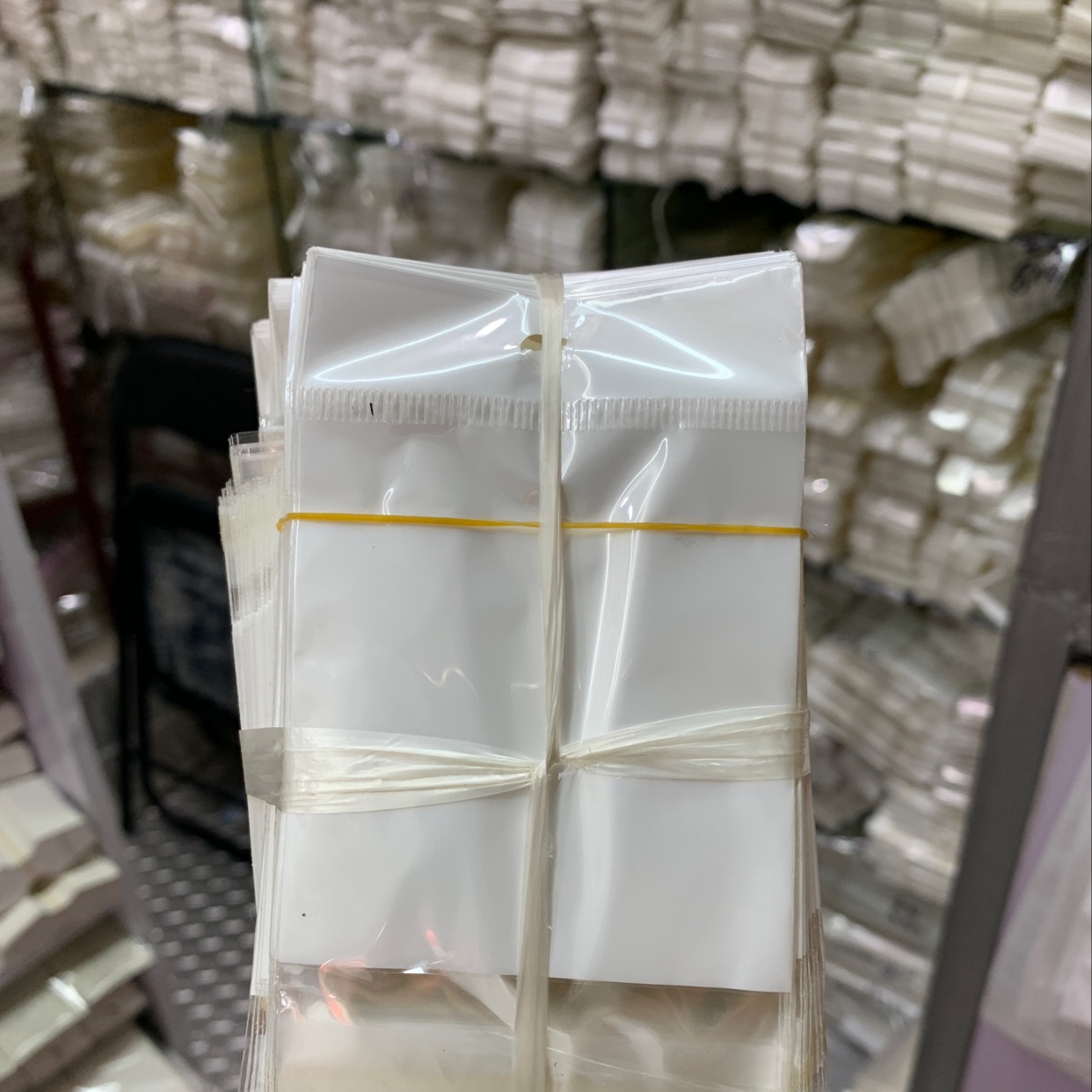 Thick plastic bag holding various items