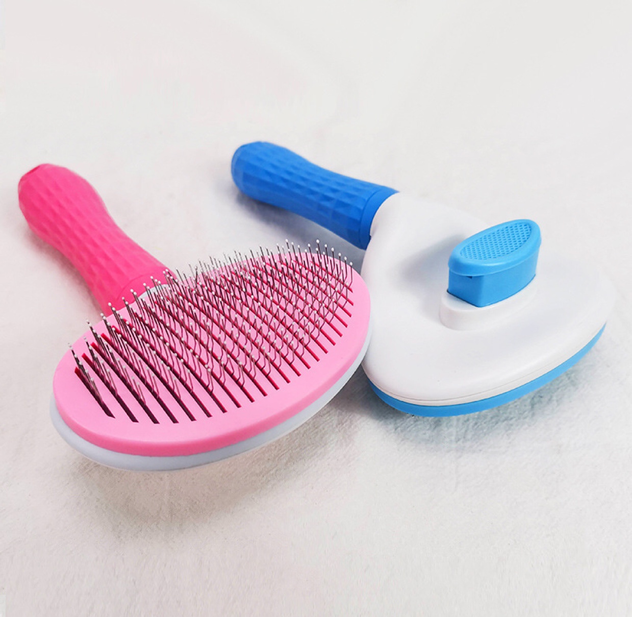 Factory direct pet comb Pet brush massage automatic hair removal comb dog knot comb hair removal cat comb Application Scenario