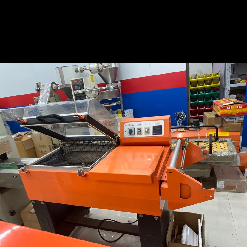 Fully automatic two-in-one shrink packaging machine