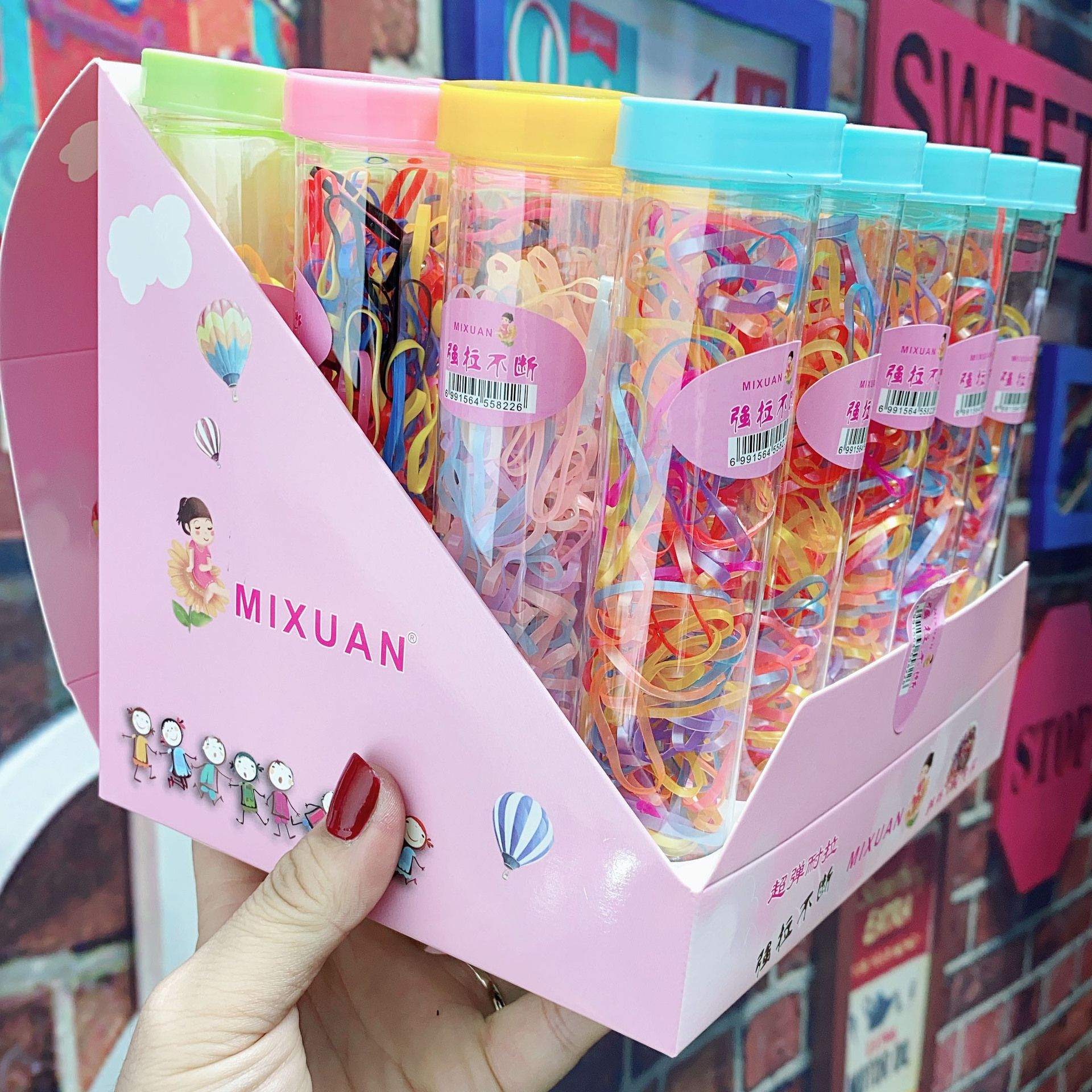 Korean version of children's hair accessories pen box shaped plastic box strong pull continuously disposable baby hair band full figure
