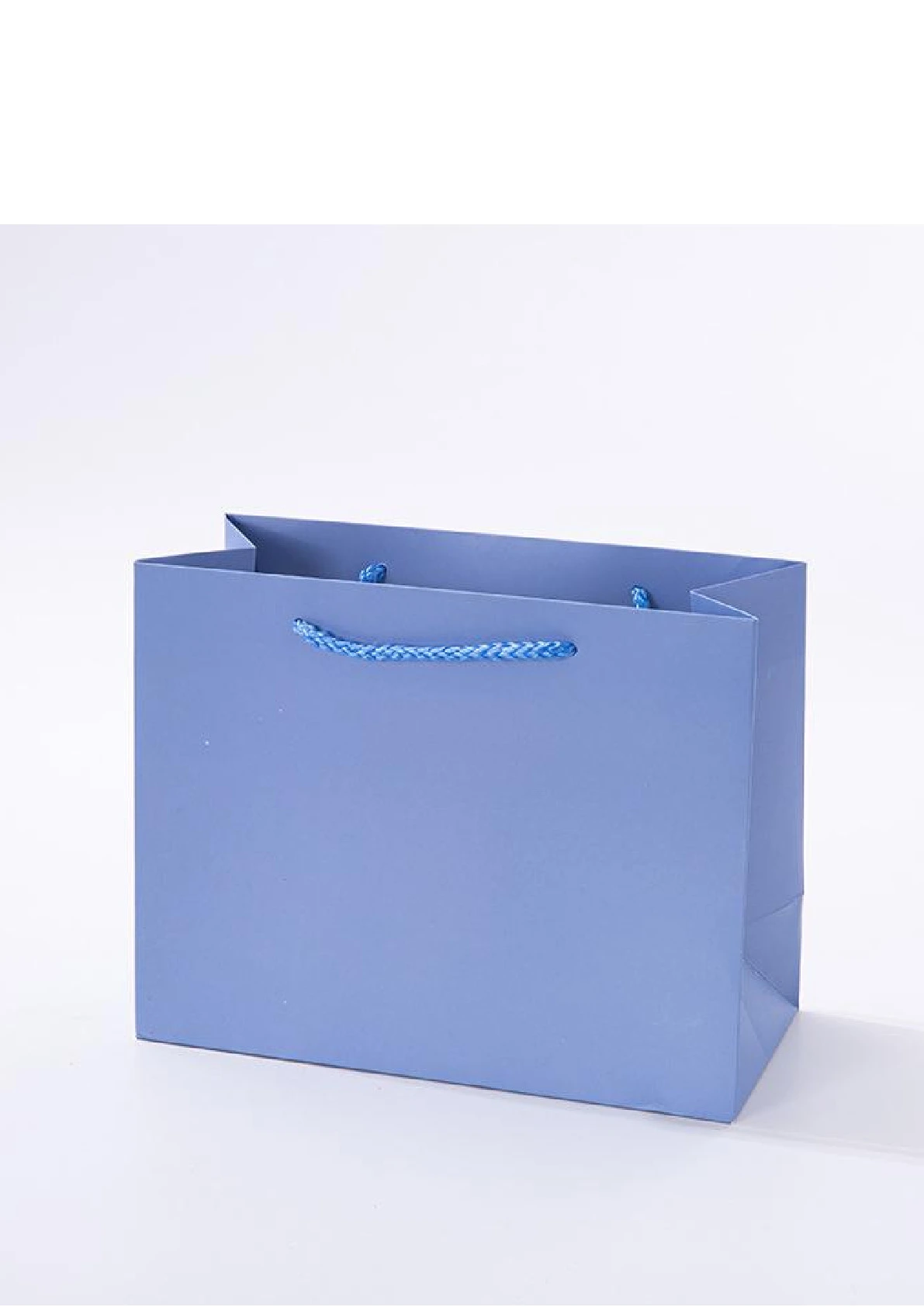 Wholesale and customization of high-end single-color gift bags, special color white card paper, universal handbags, cosmetic gift bags detail image 4