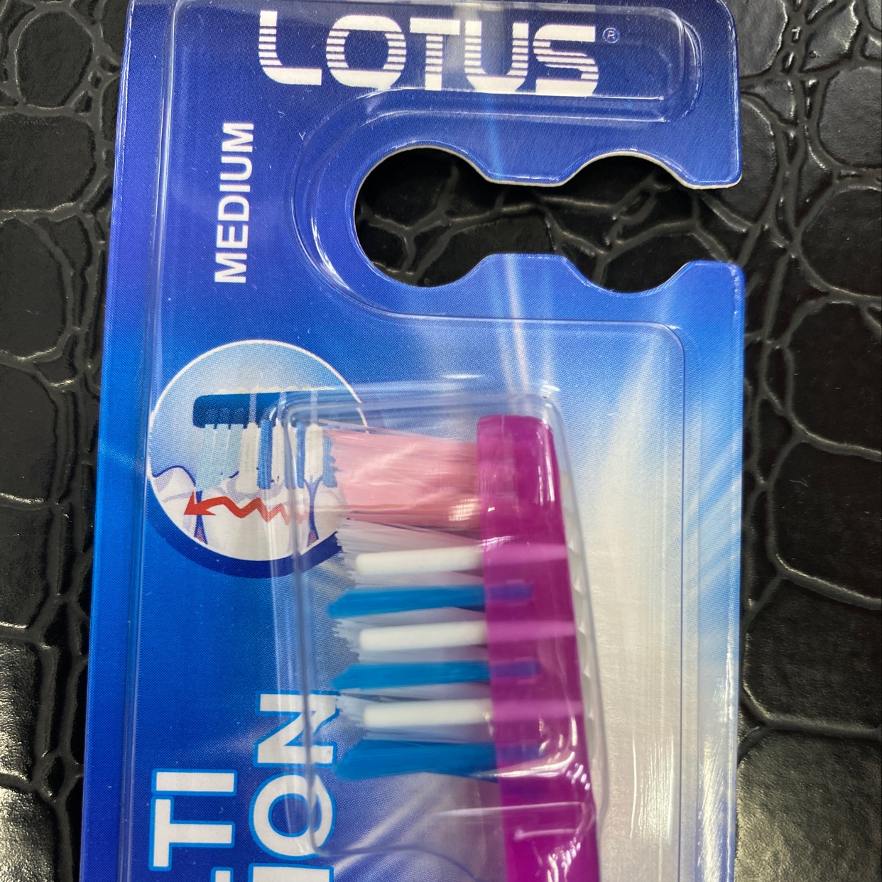 Cross Bristled Toothbrush details Picture