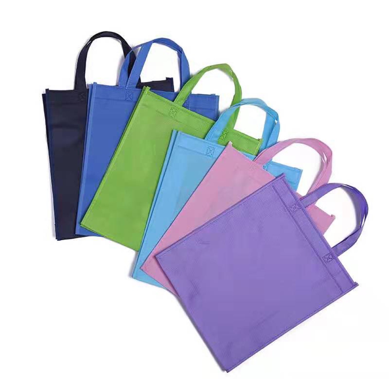 手提袋童装饰品卡通兔子PE手提袋礼品广告服装购物手提袋