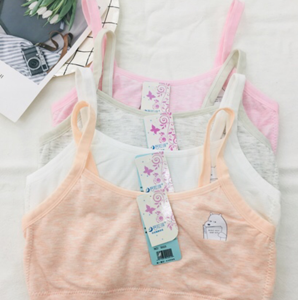 Set of photos showing different colors and styles of vest underwear
