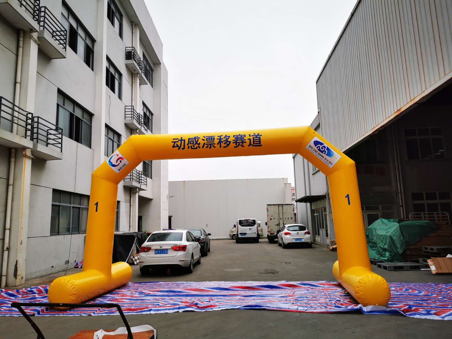 Custom inflatable arch with company logo at promotional event