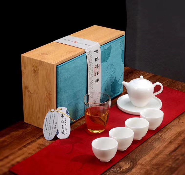 Yiwu Selection jade porcelain one pot four cups with justice cup with pot bearing tea table gift box set thumbnail