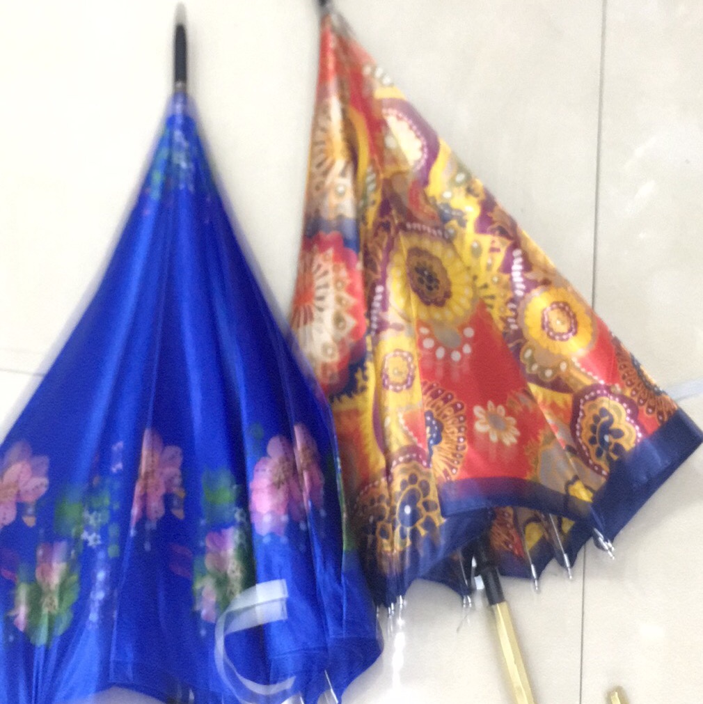 A small colored lilac umbrella