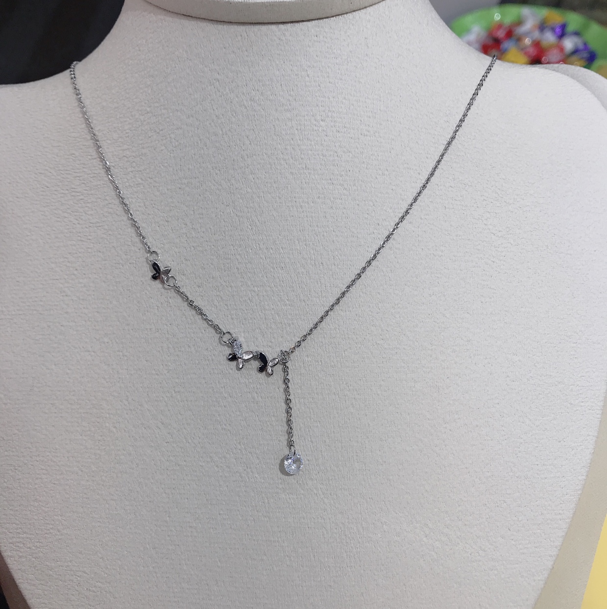 Stretchable white stone multiple butterfly necklace