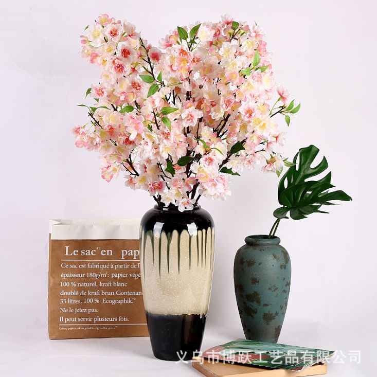 Yiwu's high-quality simulated large cherry blossom branches, highly realistic cherry blossom simulation flower landscaping site arrangement, simulated cherry blossom home decoration project flowers, garden landscape window display project