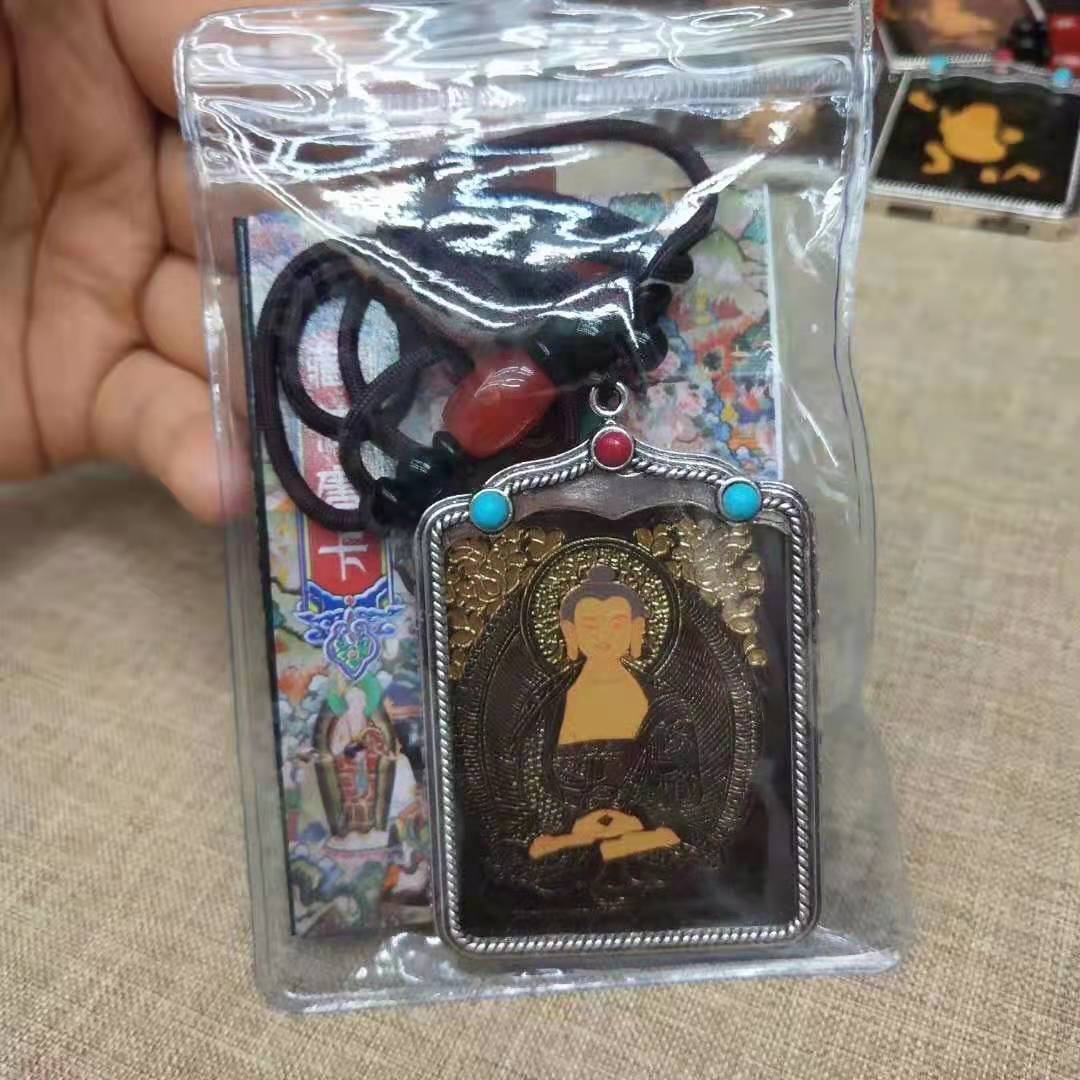 The Tibetan black gold Thangka necklace featuring the twelve zodiac signs and eight guardian deities brings good luck in the Year of the Rabbit undefined