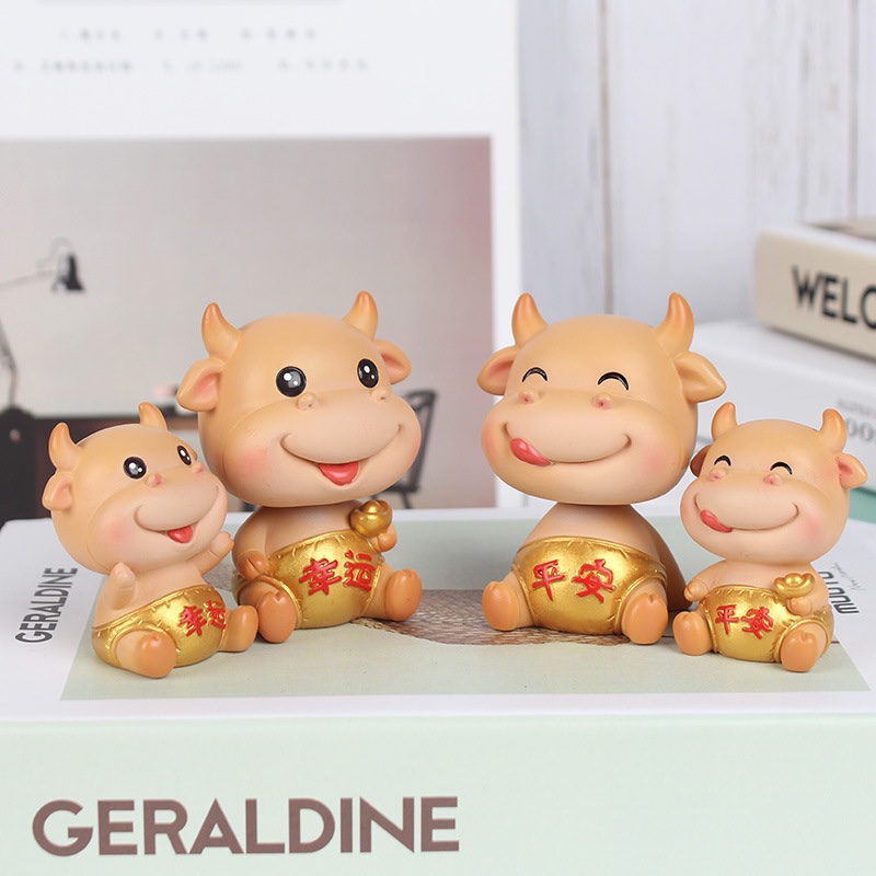 A large-sized Niu Xiaobao figurine for the Year of the Ox