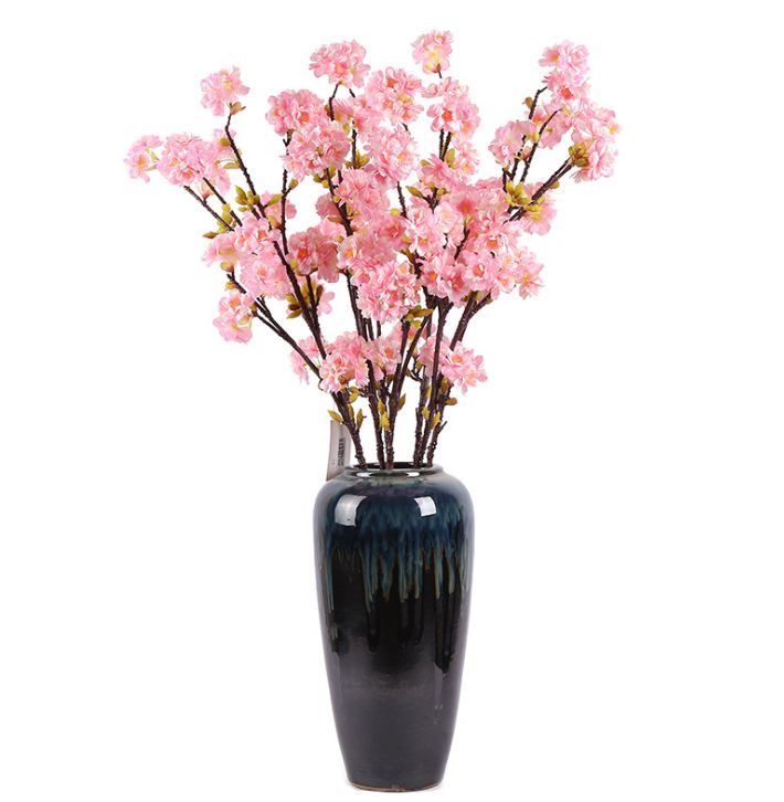 Yiwu high-quality faux 4-pronged cherry blossom silk fabric faux flower wholesale, cherry blossom tree flower arrangement bouquets