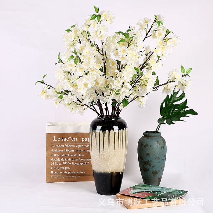 Yiwu's high-quality simulated large cherry blossom branches, highly realistic cherry blossom simulation flower landscaping site arrangement, simulated cherry blossom home decoration project flowers, garden landscape window display project details Picture