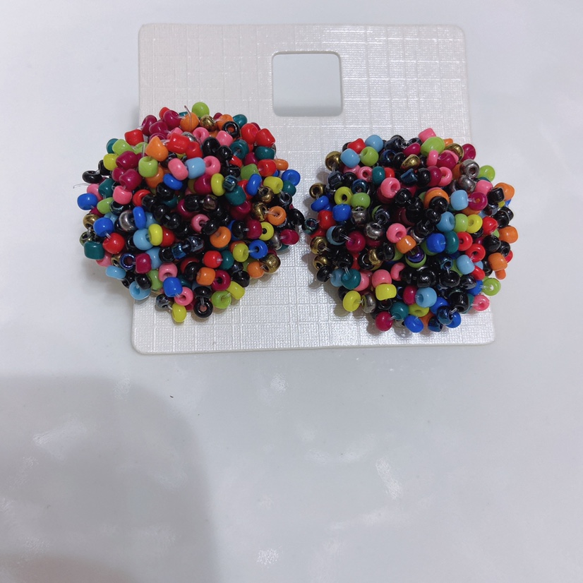 Hand-woven rice bead earrings. Dazzling earrings Item Picture
