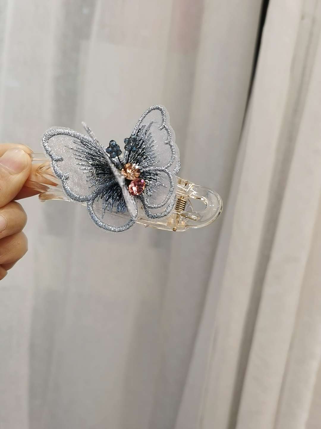 Hot Butterfly In The Claw