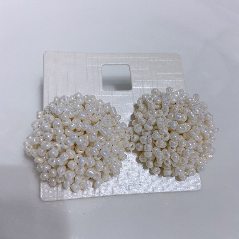 Hand-woven rice bead earrings. Dazzling earrings undefined