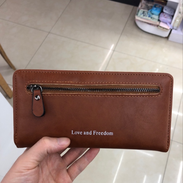 Two-fold slot zipper wallet