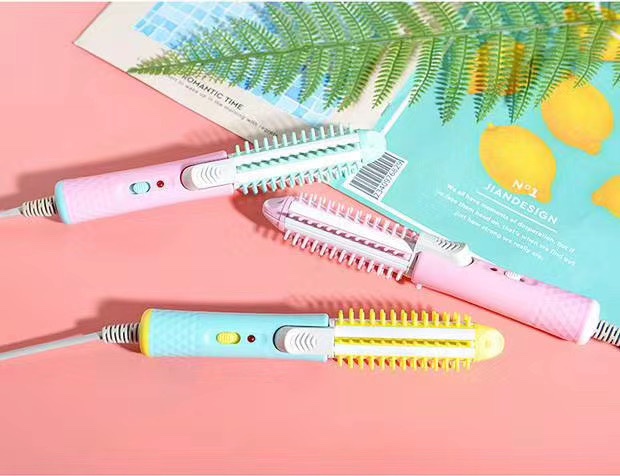 Two mini curling irons for use