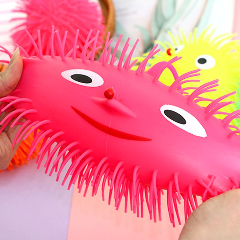 TPR刺猬毛毛球弹力四色笑脸发泄儿童玩具产品图