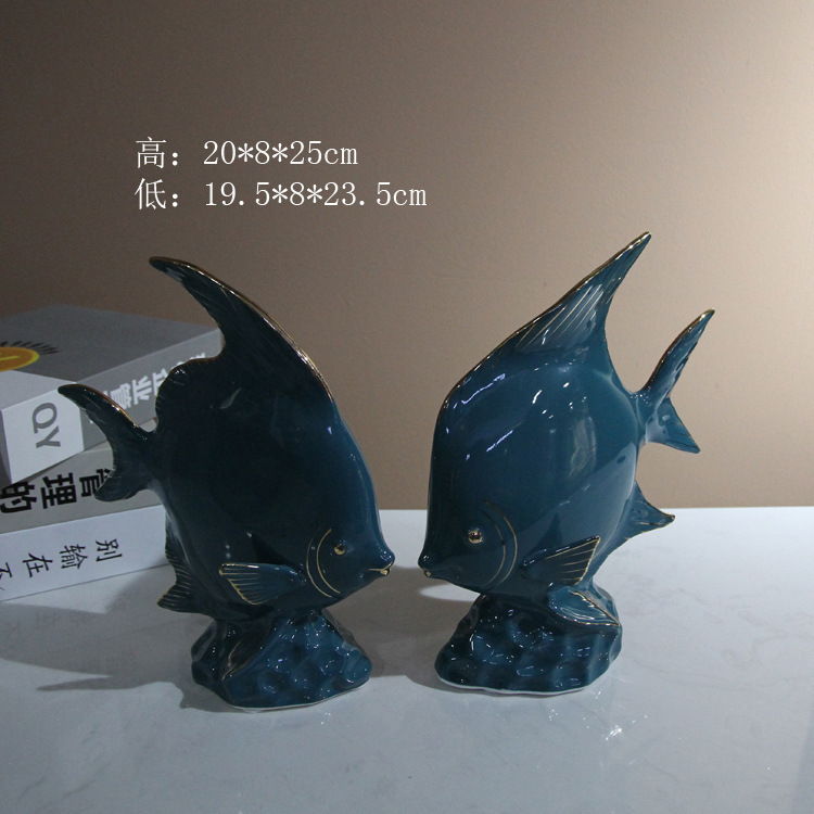 Ceramic fish figurine in dark green with gold plating, a modern home decoration with fish every year, a creative abstract handicraft display details Picture
