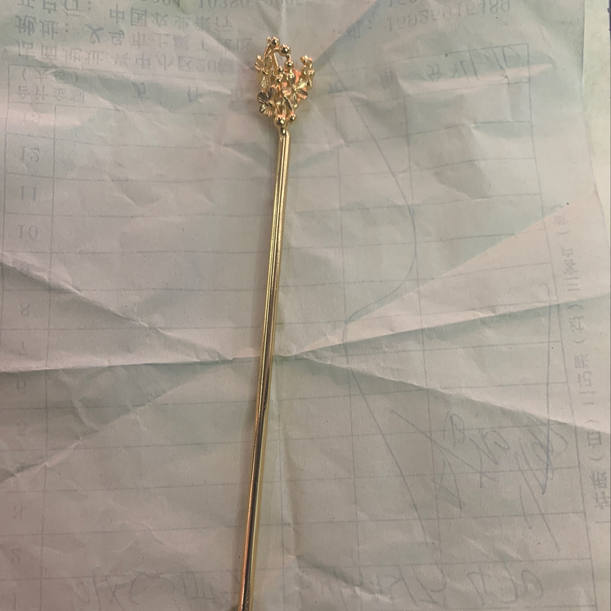 Cast copper flower-wrapped hairpins