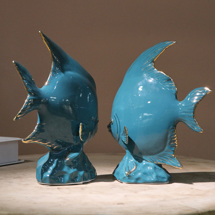 Ceramic fish figurine in dark green with gold plating, a modern home decoration with fish every year, a creative abstract handicraft display Item Picture