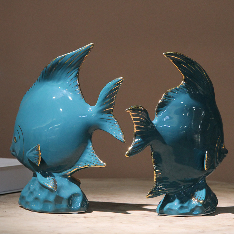 Ceramic fish figurine in dark green with gold plating, a modern home decoration with fish every year, a creative abstract handicraft display Specification image