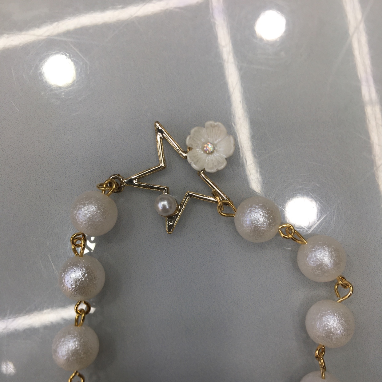 Korean version of fashion wrinkle bead alloy star flower bracelet for women thumbnail
