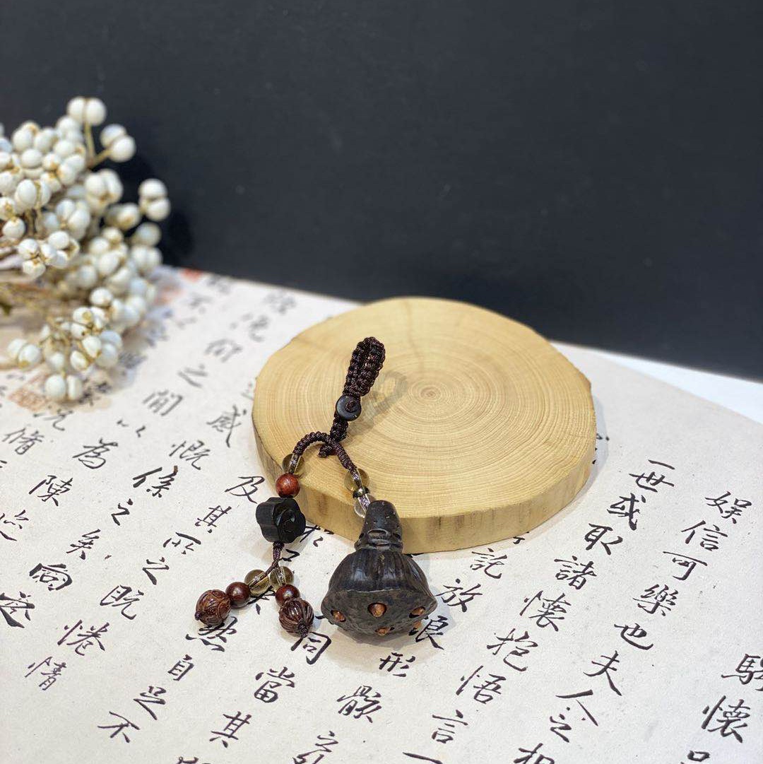 黑檀木莲蓬钥匙扣图